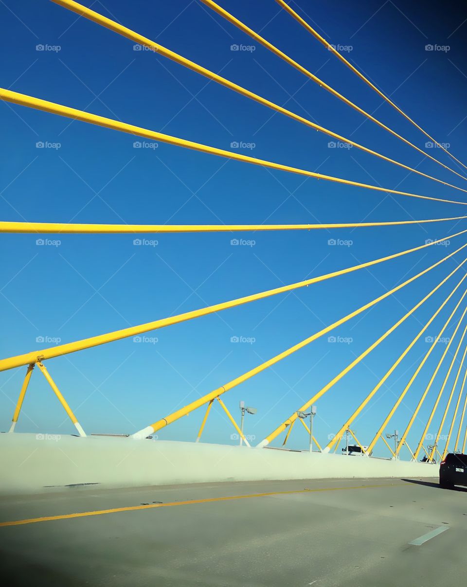 The bright yellow rods of the famous Skyway Bridge.