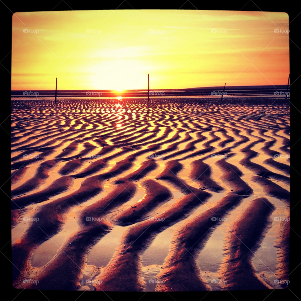 pyla sur mer. france sunset sand low tide by alicedebarrau