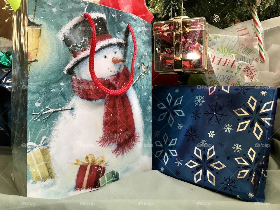 Christmas gifts under a tree