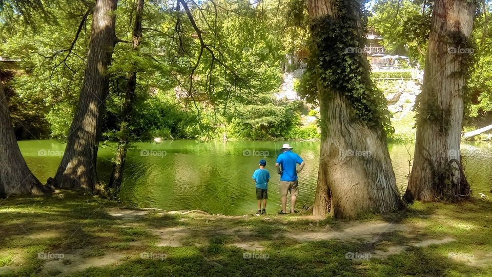 Father and son fishing.