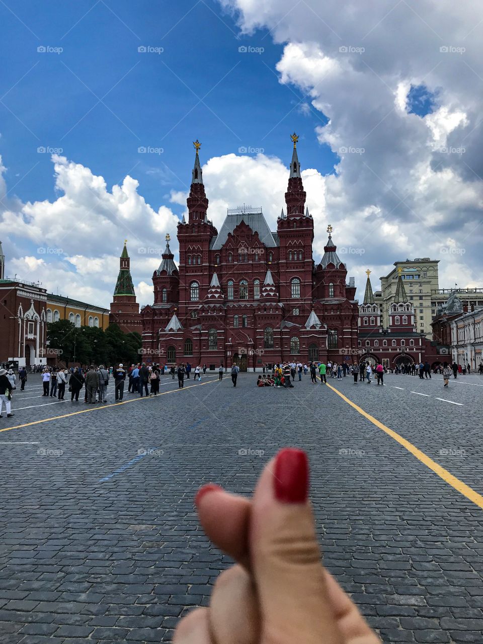 Red nails in Red Square, Russia, Moscow. Red Square is a historic fortress and centre of government known as the Kremlin. It has been the scene of executions, demonstrations, riots, parades, and speeches. 