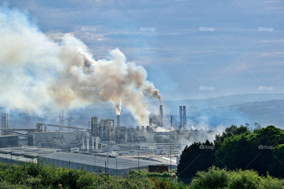 Smoke emitting from smoke stack