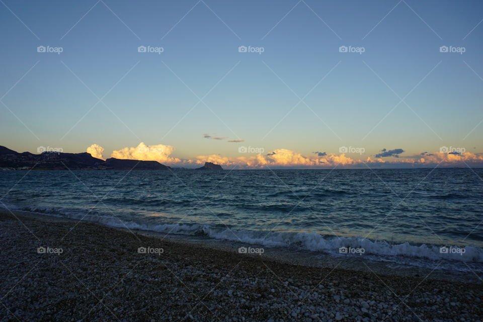 Sunset#beach#clouds#stones#mountain#moment