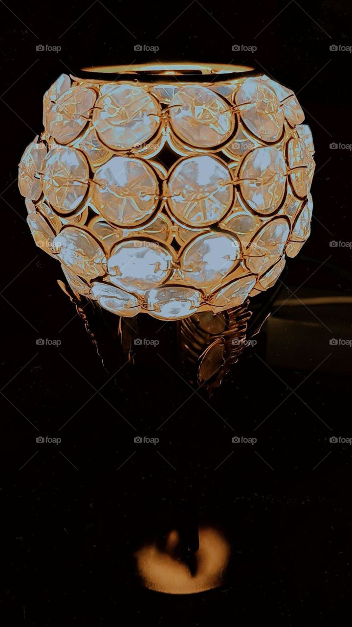 That glowing object in the darkness with lights on looks so mysterious and intriguing! It's like a beacon of light in the night. πβ¨