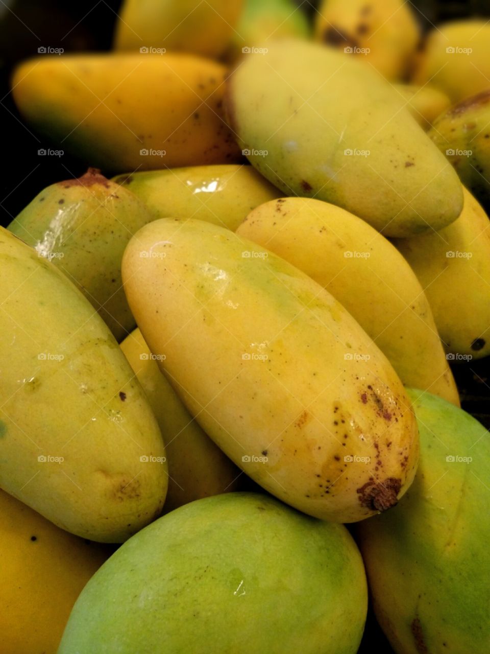 ripe yellow mangoes