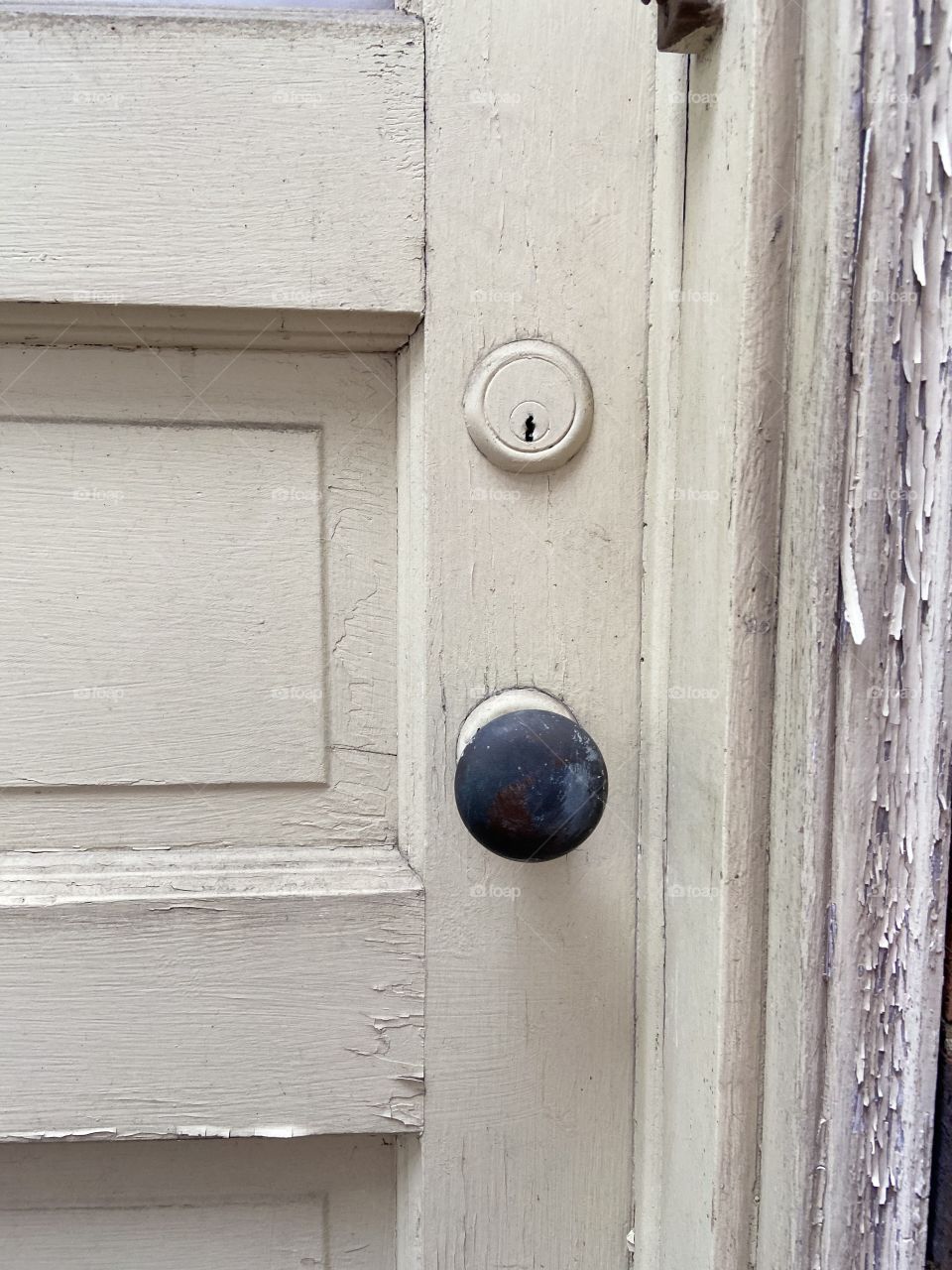 Antique door close up of lock and door knob 