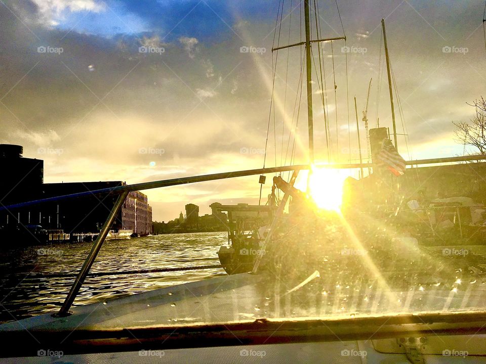 The Newtown Creek “harbor area” with all its boats photographed at the golden hour of sunset and upcoming nightfall on an early evening in the Fall of 2021. Hypnotic Productions