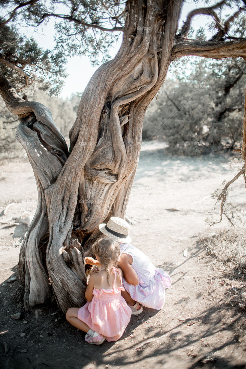 Little sisters playing outdoor