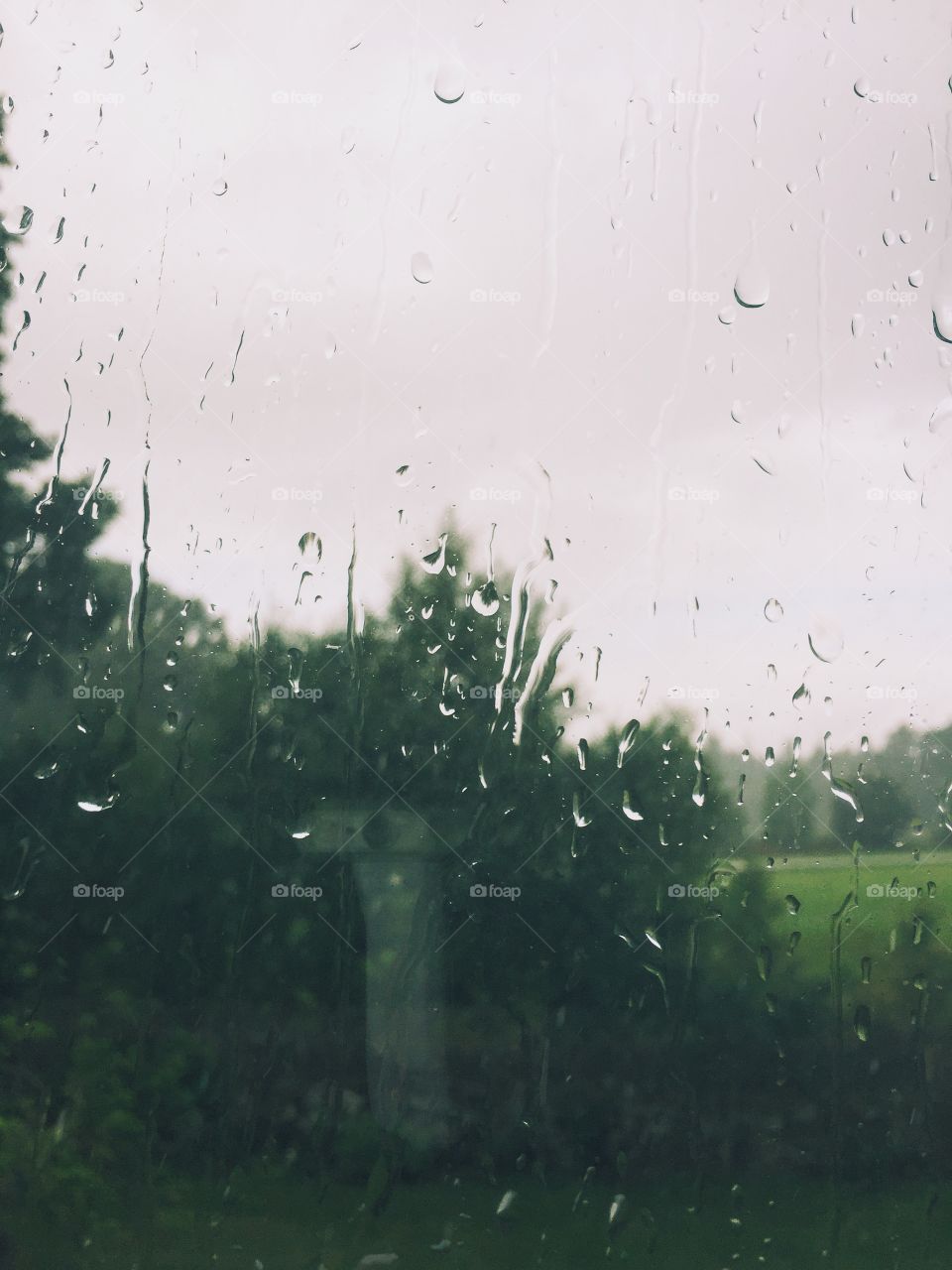 Rainy weather, water on the window