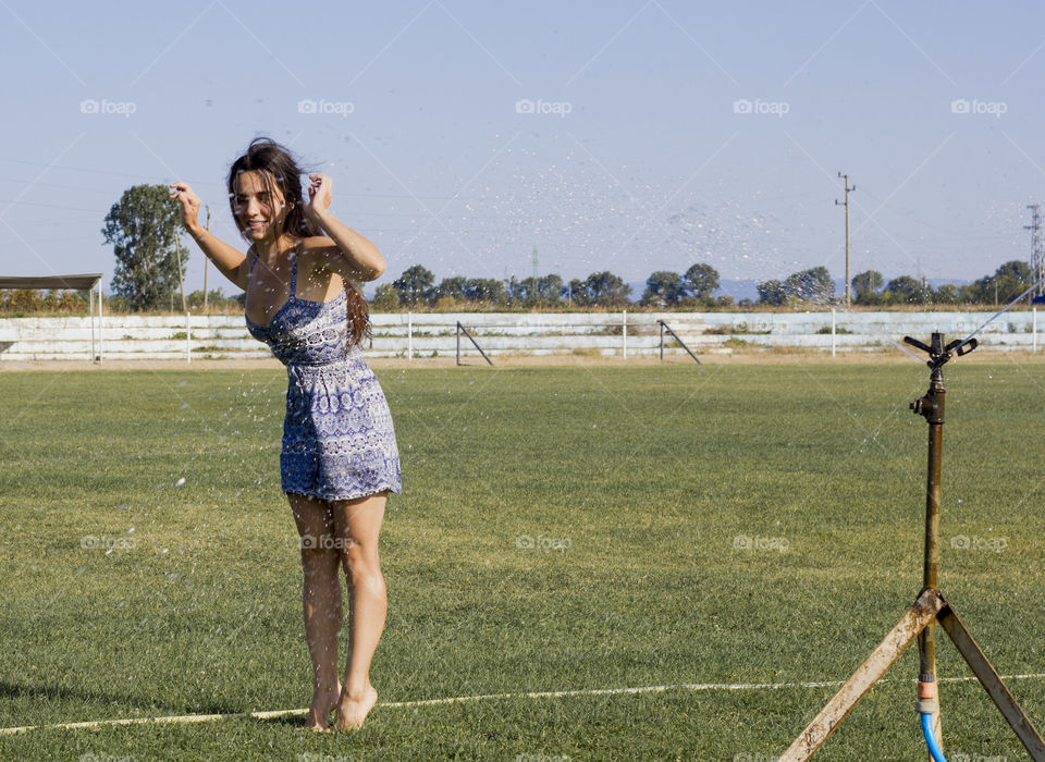Summer joy with water sprinkler