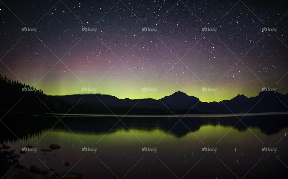 The Northern Lights over Lake McDonald in Glacier, MT. It’s very rare that the Aurora Borealis make an appearance this far south, so experiencing this was an absolute treat an experience that will be cherished for the rest of my life. 