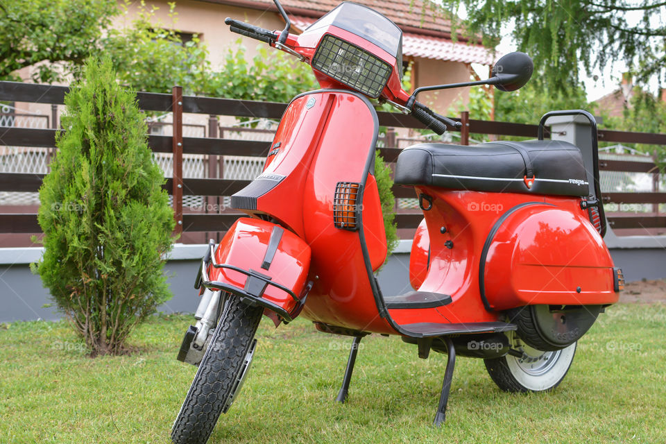 red italian classic vespa T5 motorcycle