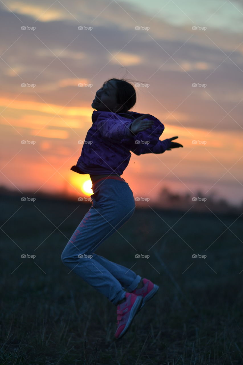 Girl at sunset