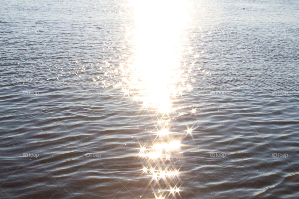 water reflection sun