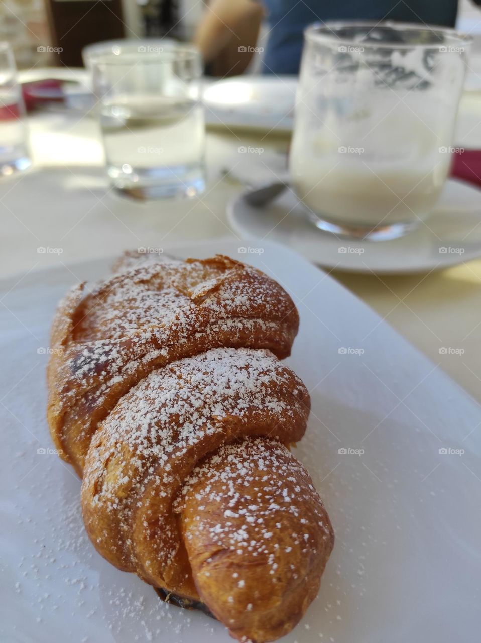 happy breakfast with a croissant with jam