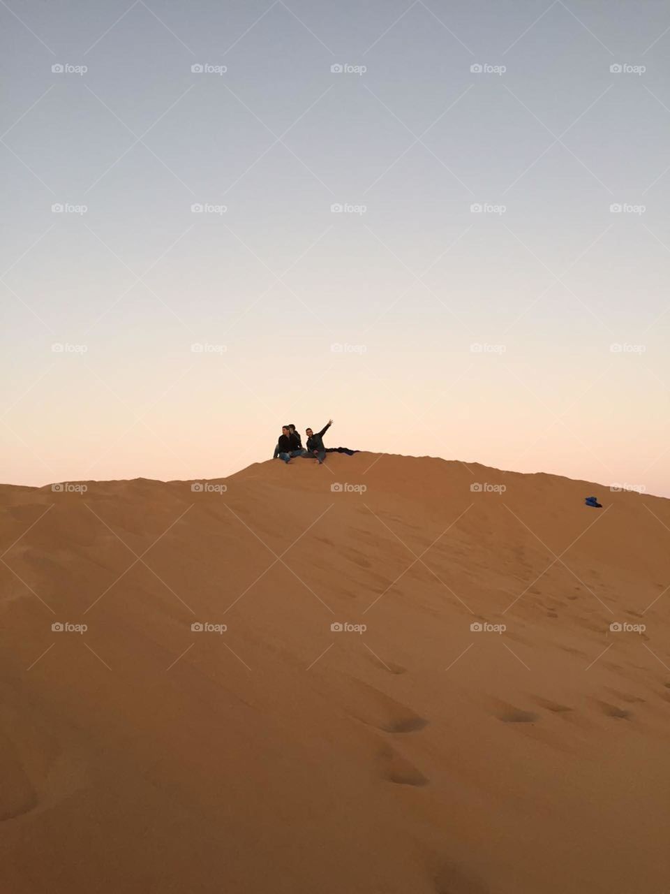 happines on sand dunes in desert