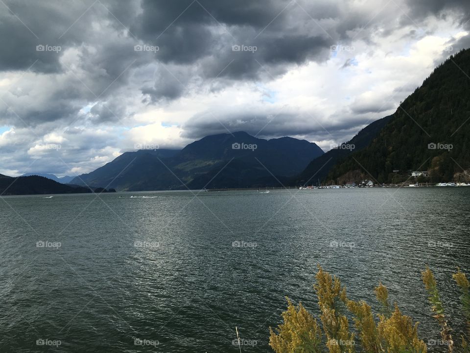 Grey clouds and grey  lake