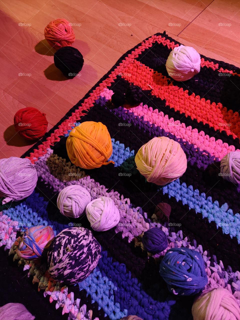 wool and carpet made out of old shirts