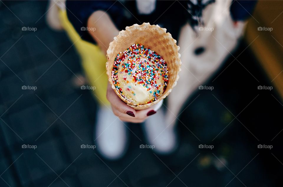 Woman holding ice cream 