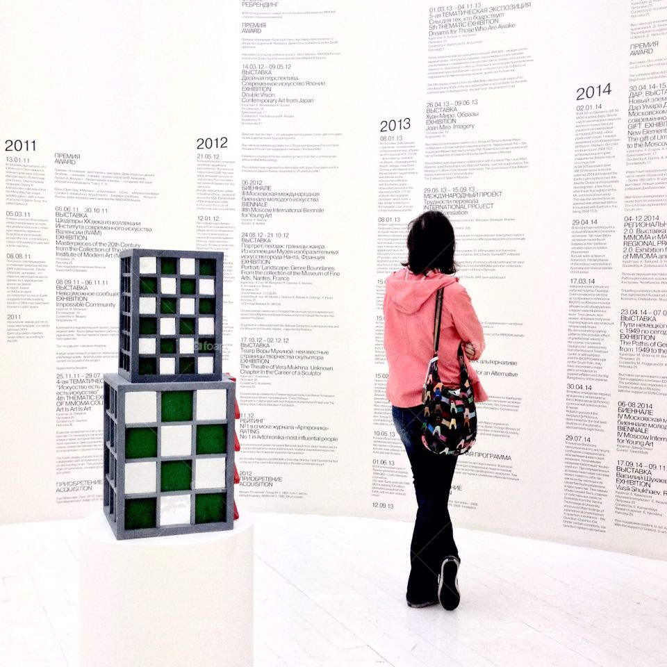 Girl at the exhibition . Girl on the exhibition of contemporary art
