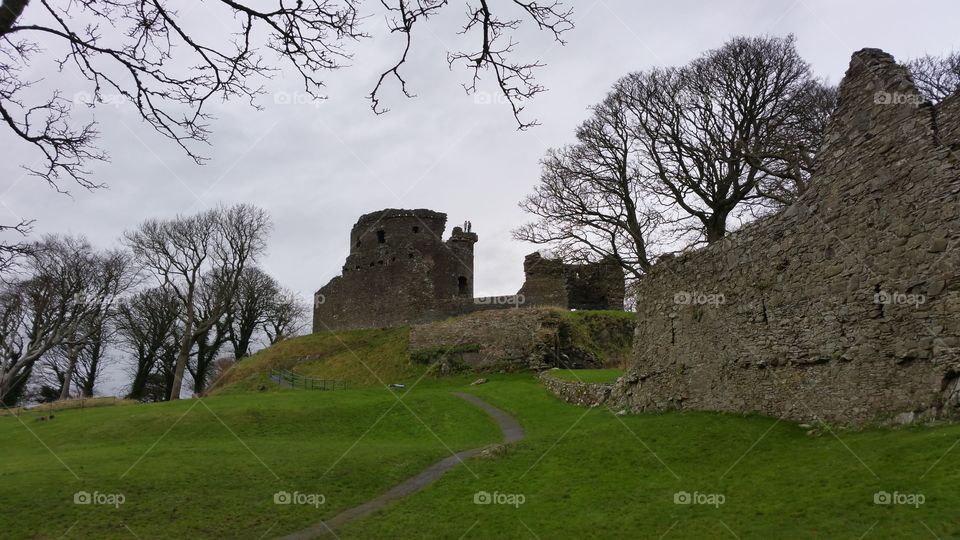 Ruin stone castle in Ireland winter