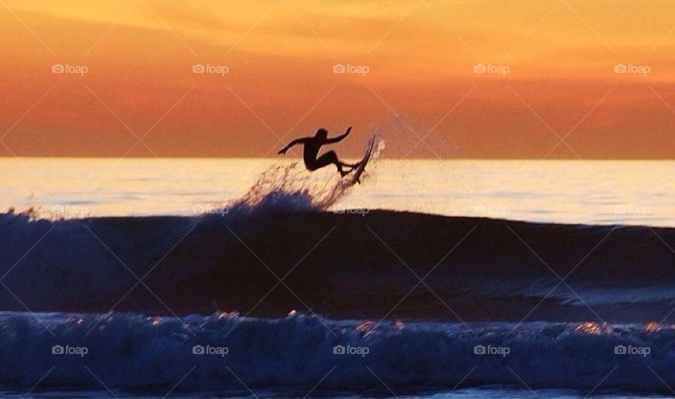 Sunset surfer