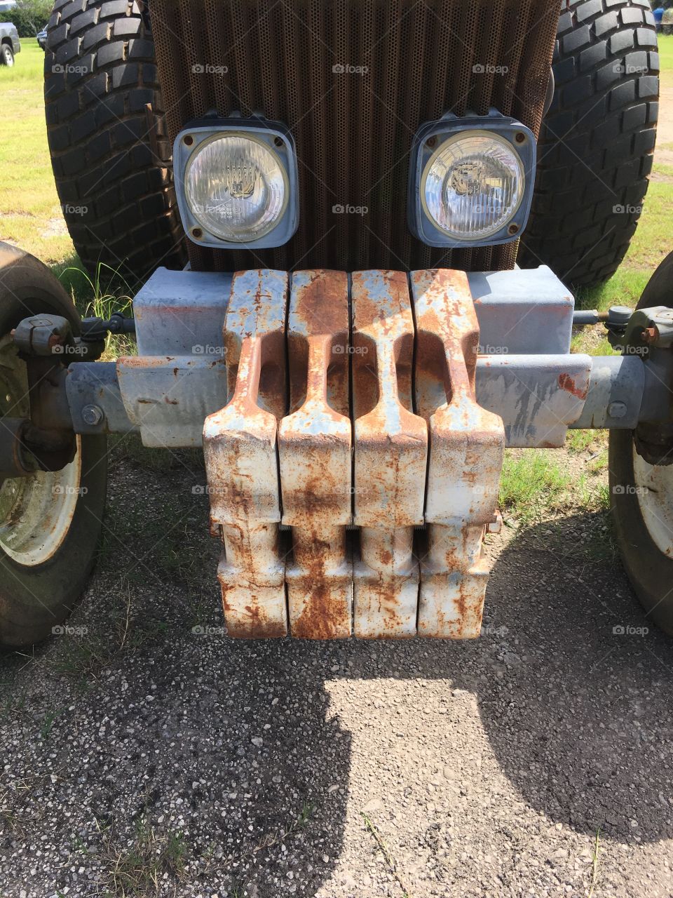 Face on a tractor with headlights 