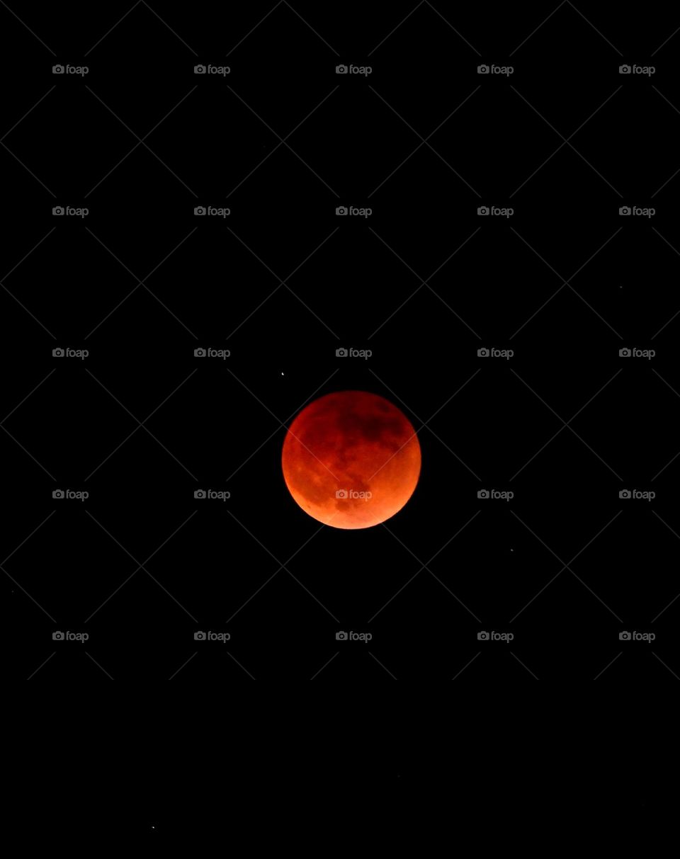 My photos of the Blood Moon, Total lunar eclipse on 15 May 2022 - Lunar eclipses occur when Earth aligns between the sun and the moon and casts a shadow across the lunar surface. The weather condition were very cloudy