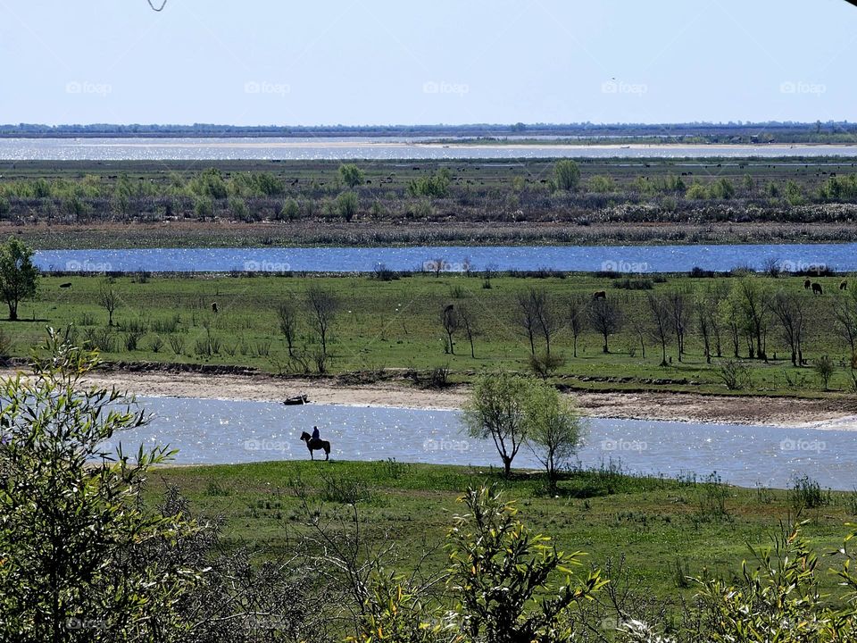 "Peaceful ride." A view to relax the mind, that brings a feeling of well-being. Beautiful landscape of San Pedro, Prov of BsAs, ARG on the banks of the Rio Parana.