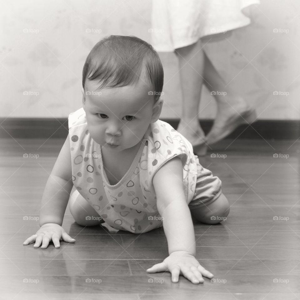 Beautiful baby girl crawling