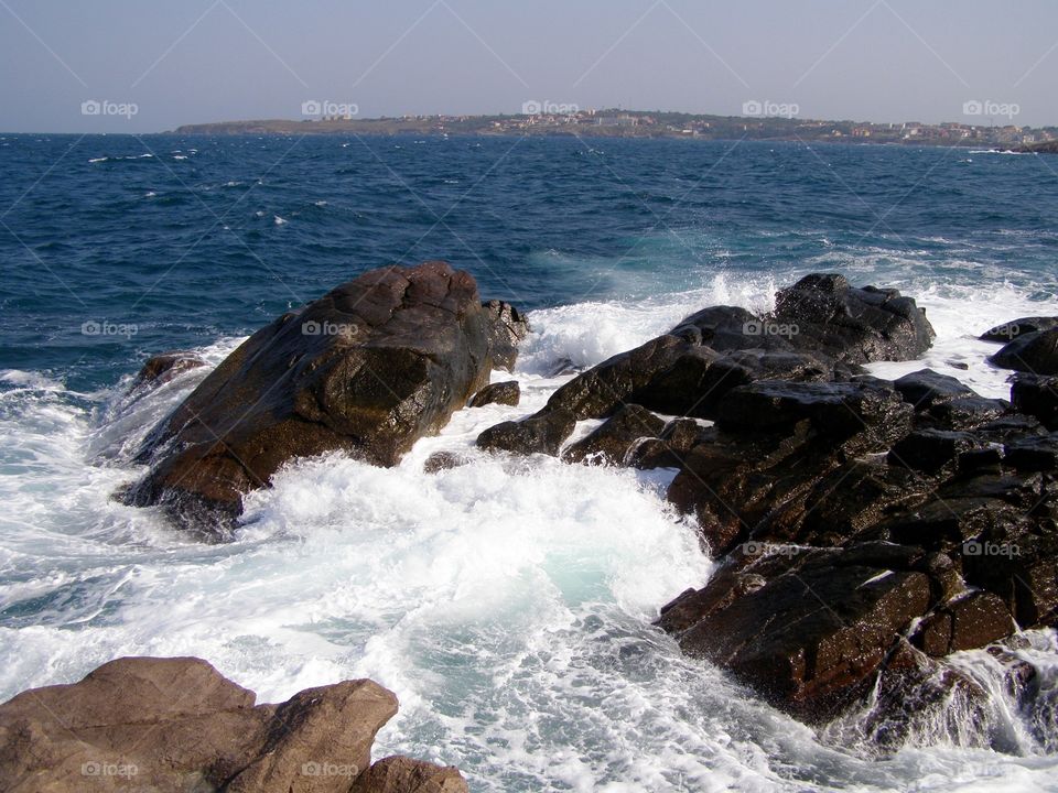 Waves and rocks on the coastline 