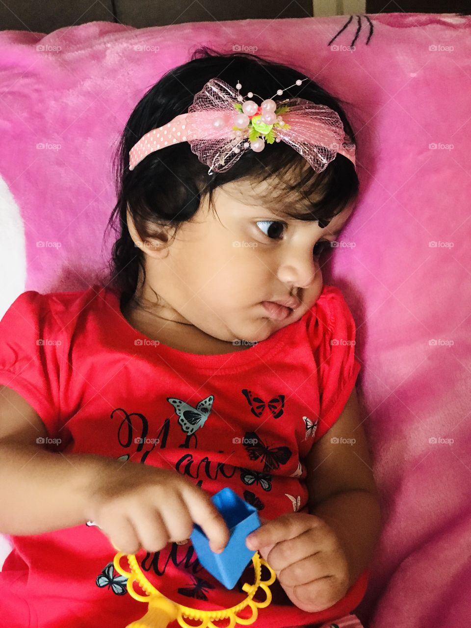 Indian baby cute pic with pink dress and hair band