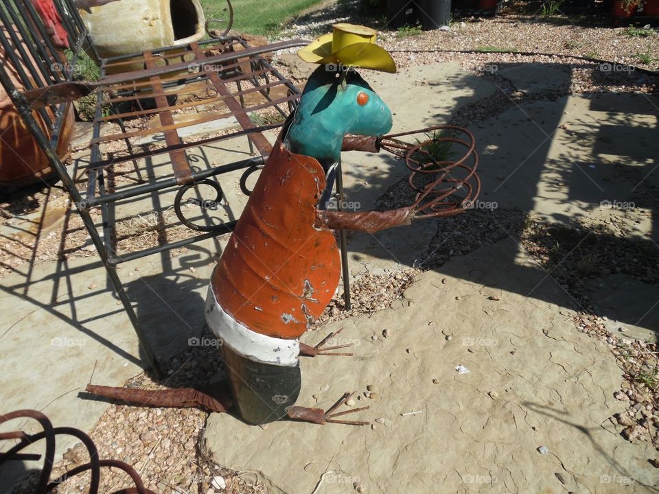 armadillo tin. This is a picture of a metallic armadillo that I saw while visiting a nursery on my way to Jacksboro Texas
