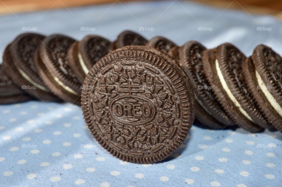 Oreo cookies on a polkadot blue background