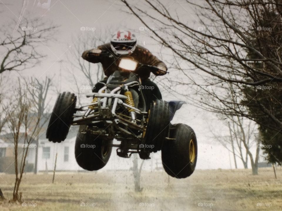 All terrain vehicle atv jumping . Motorsport in action 