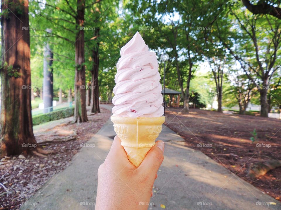 Hand holding ice-cream