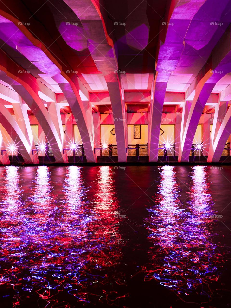 Illuminated concrete bridge in Melaka, Malaysia