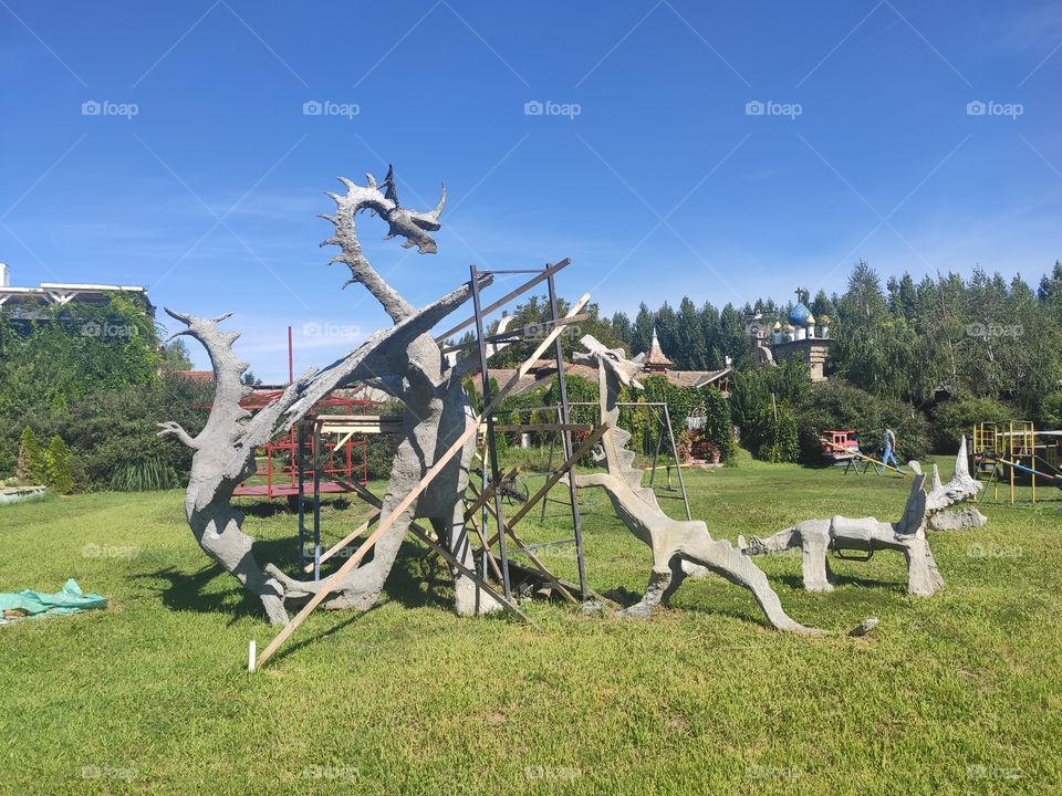Dragon and dinosaurus children playground