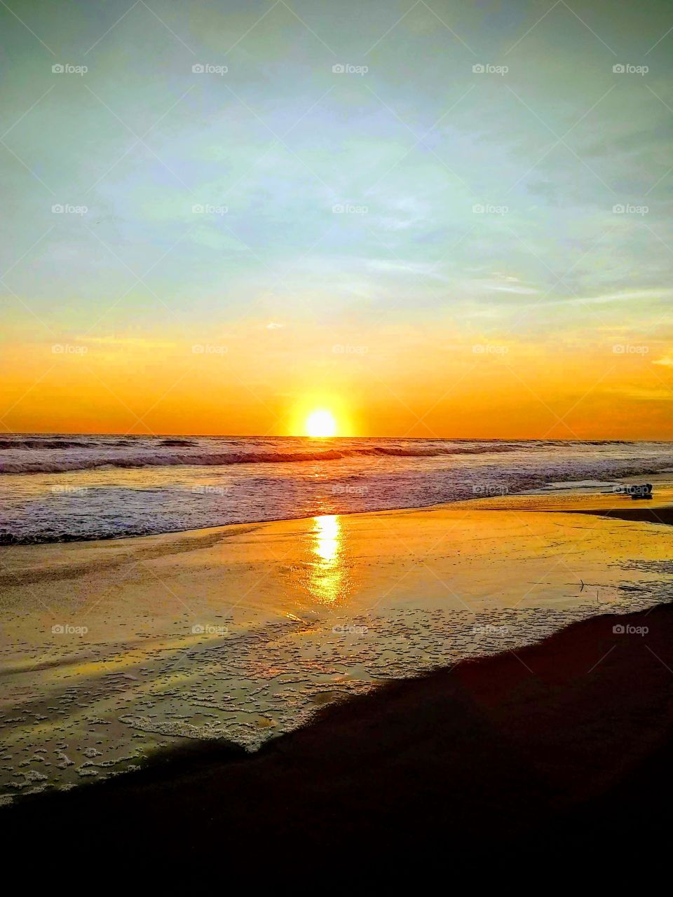 a beautiful sunset on the beach