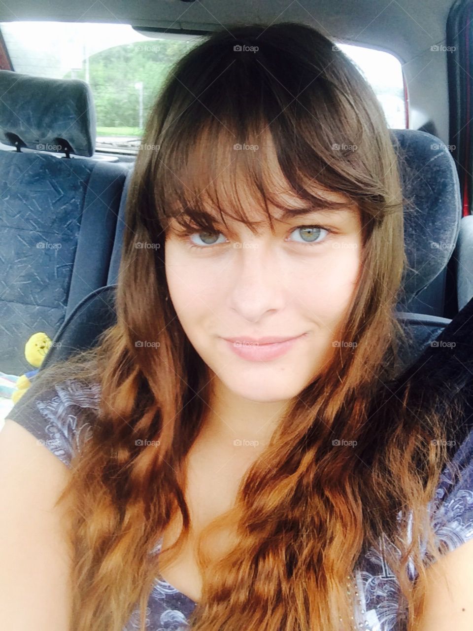 Girl in a car, going on an adventure. 