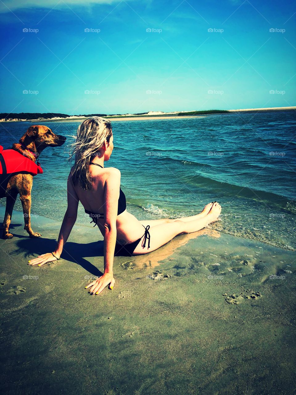 The beach and a girl with her dog what else does summer need? 