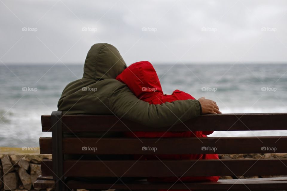 a couple watching the sea