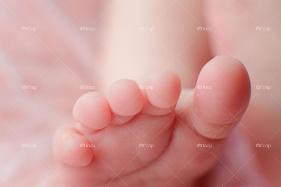 Macro photography is newborn baby foot