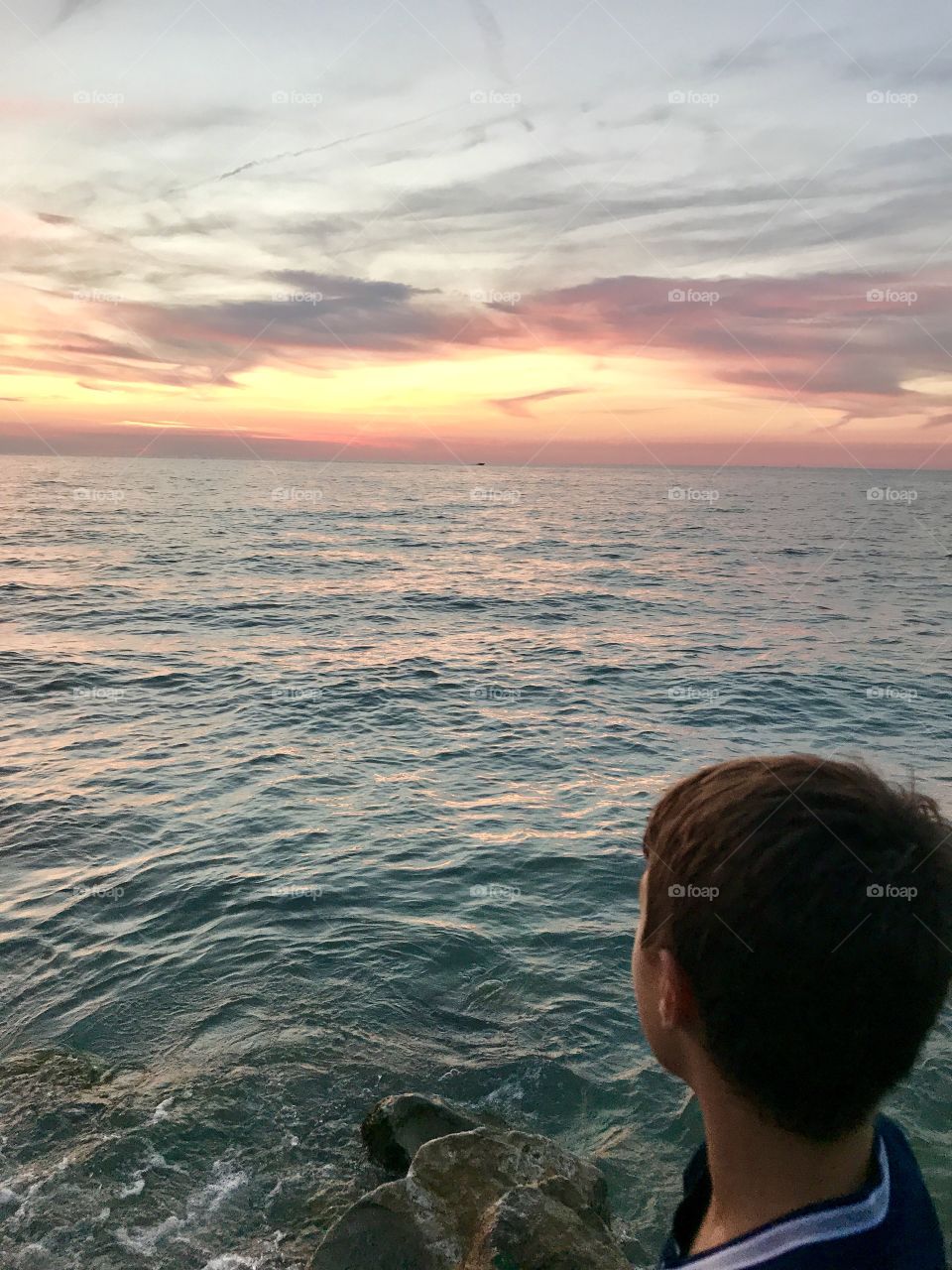 Enjoying summer vacation , watching the sunset at Mentor Beach Park, Mentor Ohio