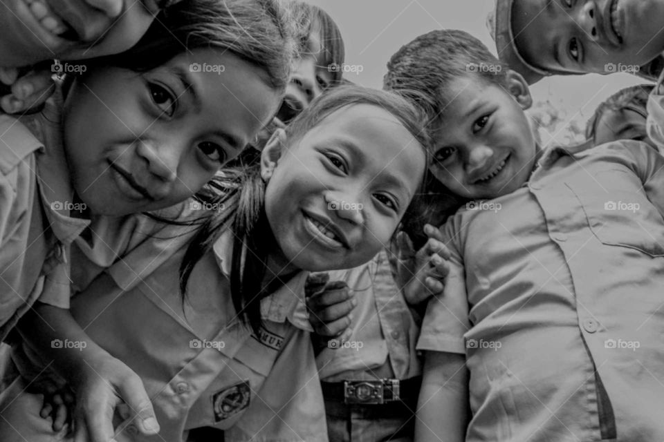 children Smiling at Camera