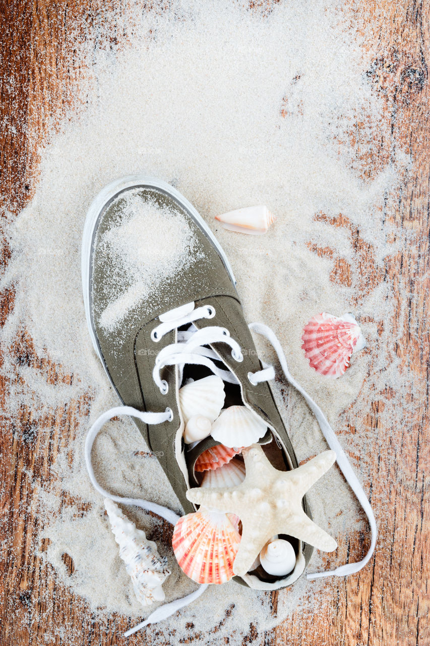 High angle view of shoe in sand