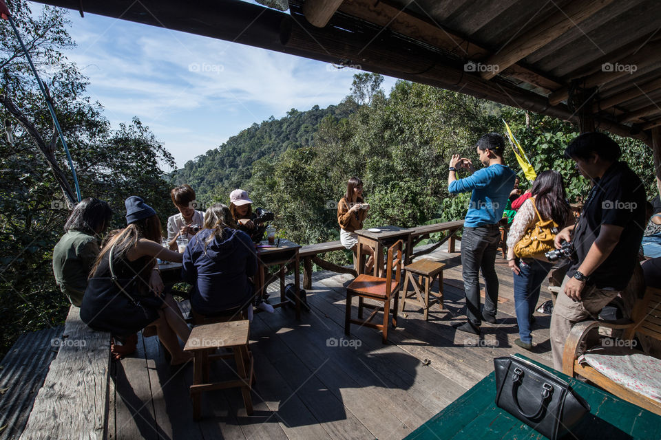 Tourist at the cafe on the mountain 