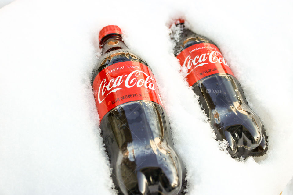 Coca-Cola- two in the snow.