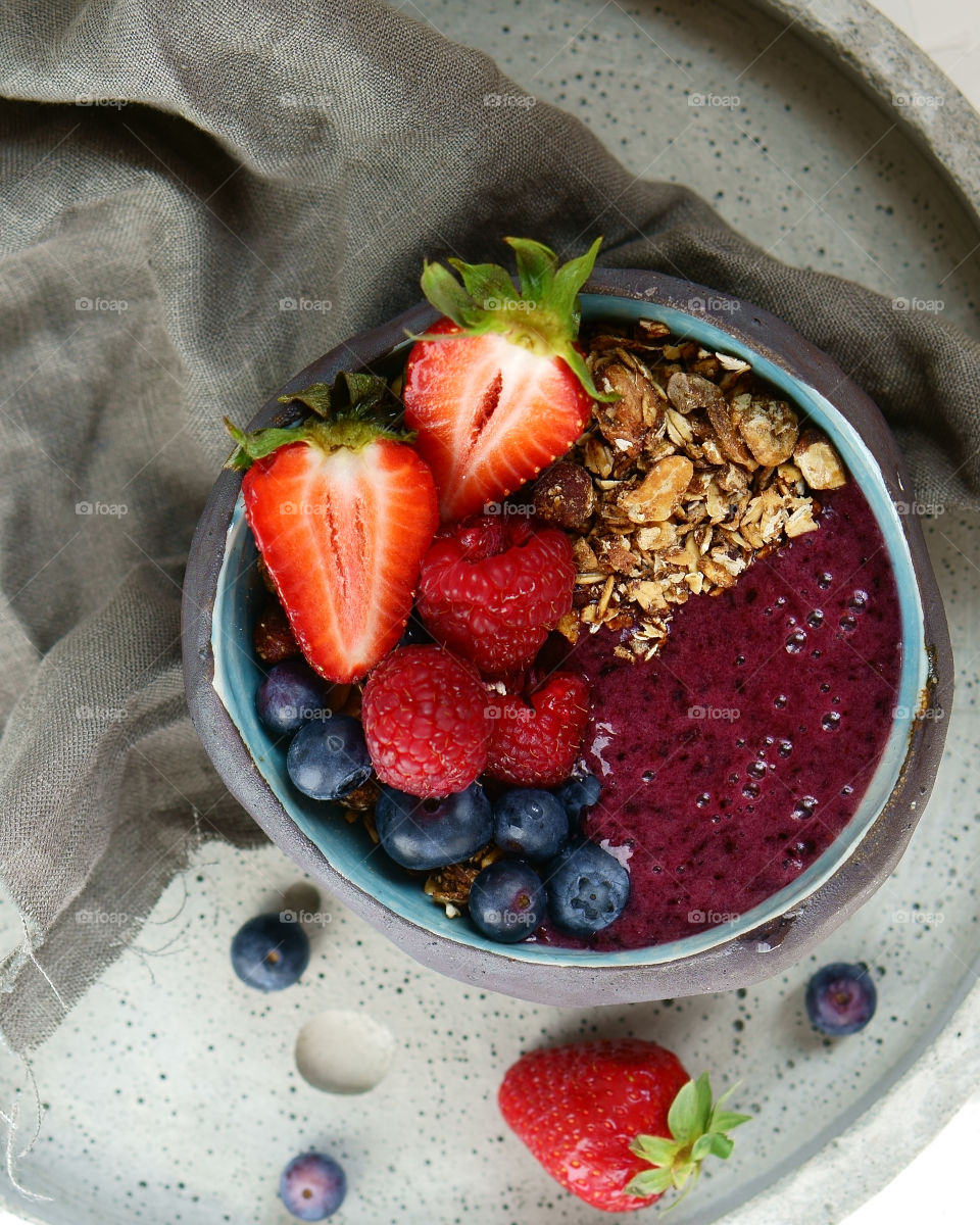 Delicious berry smoothie in bowl