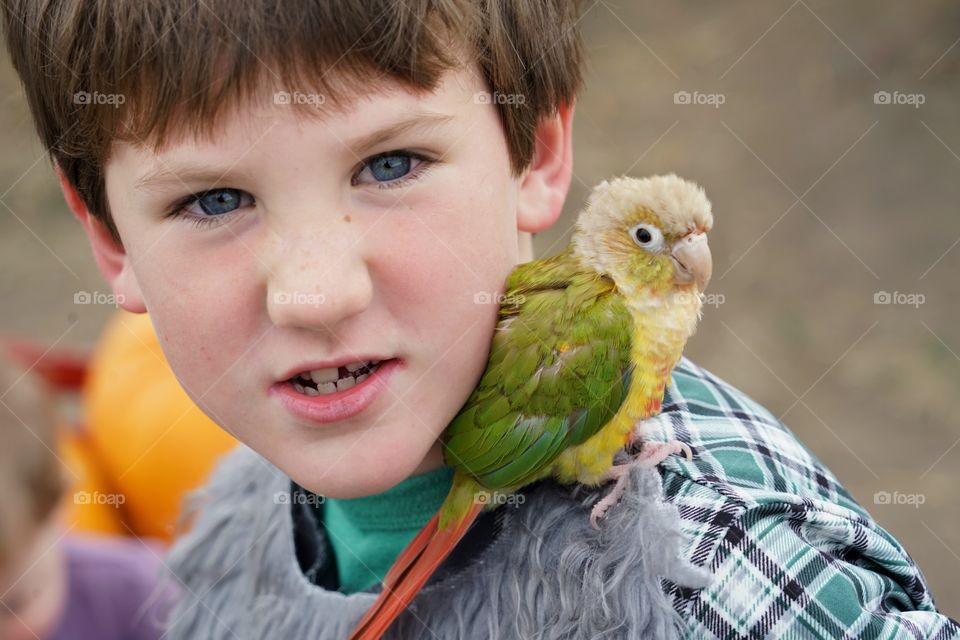 Boy With Pet Bird